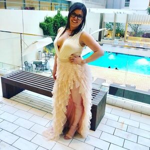 Akira Cream ruffled high waisted maxi skirt.